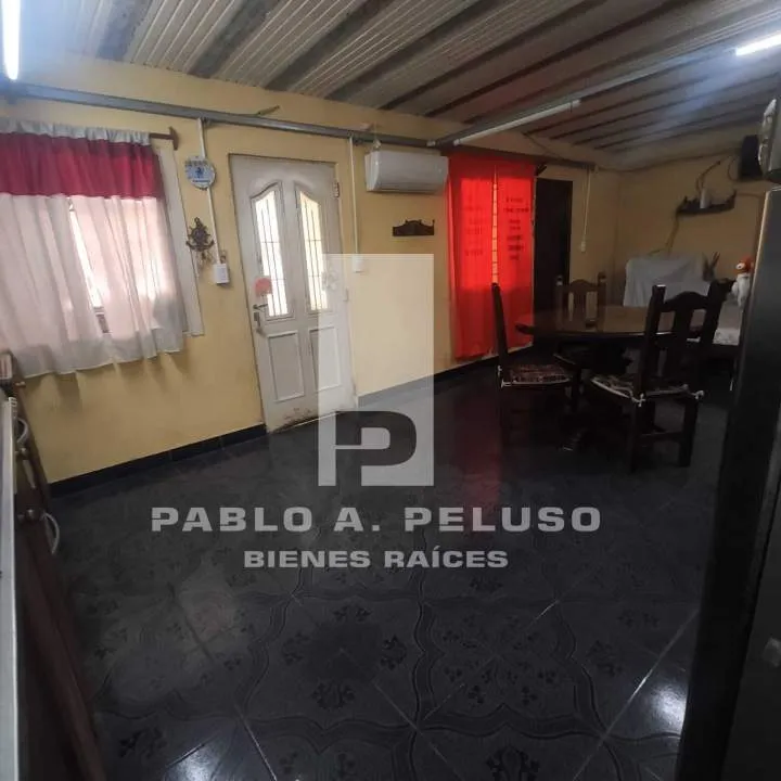 VENTA AMPLIO LOCAL USO INDUSTRIAL Y DOS DEPARTAMENTOS. MERLO. ZONA OESTE. BUENOS AIRES