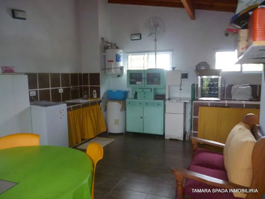 LOCAL CON VIVIENDA SOBRE AV 33