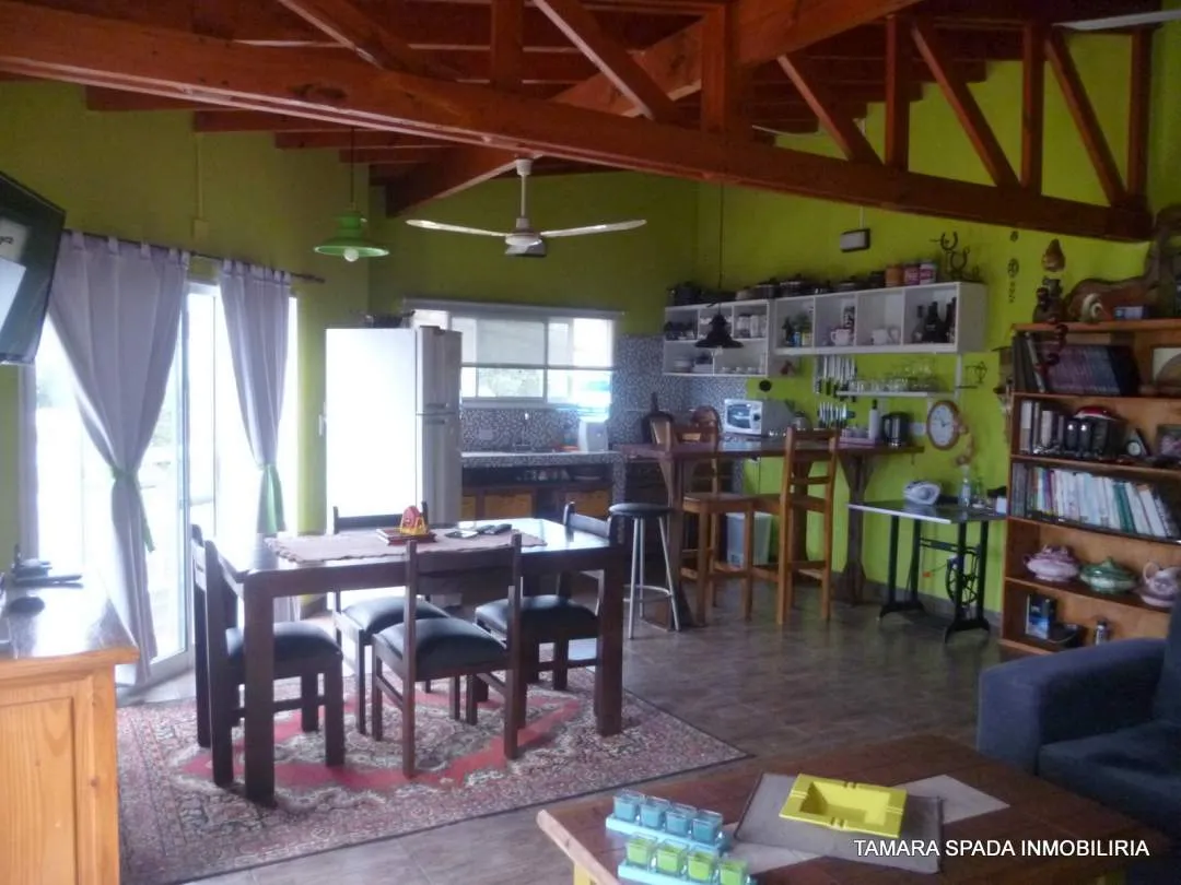 LOCAL CON VIVIENDA SOBRE AV 33
