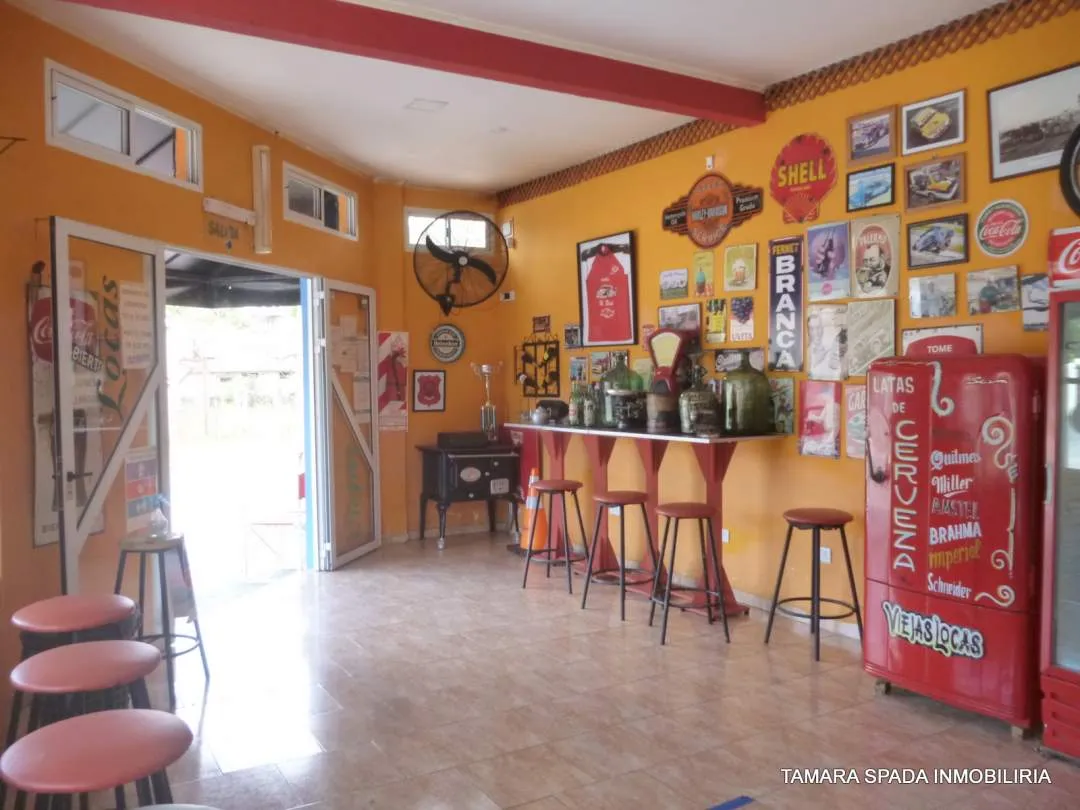 LOCAL CON VIVIENDA SOBRE AV 33