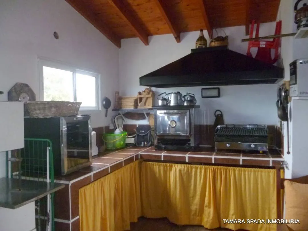LOCAL CON VIVIENDA SOBRE AV 33