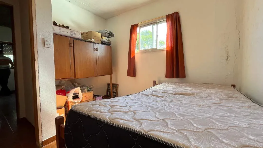 CASA SOLA EN LOTE CON LOCAL  DE 30m2 ¡FRENTE A LA RUTA!